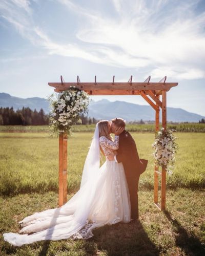 Timeless Party Rentals 'Wooden Arch' picture from gorgeous wedding in Errington, farm setting.