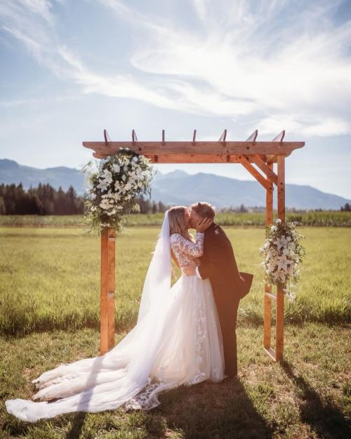 Timeless Party Rentals 'Wooden Arch' picture from gorgeous wedding in Errington, farm setting.